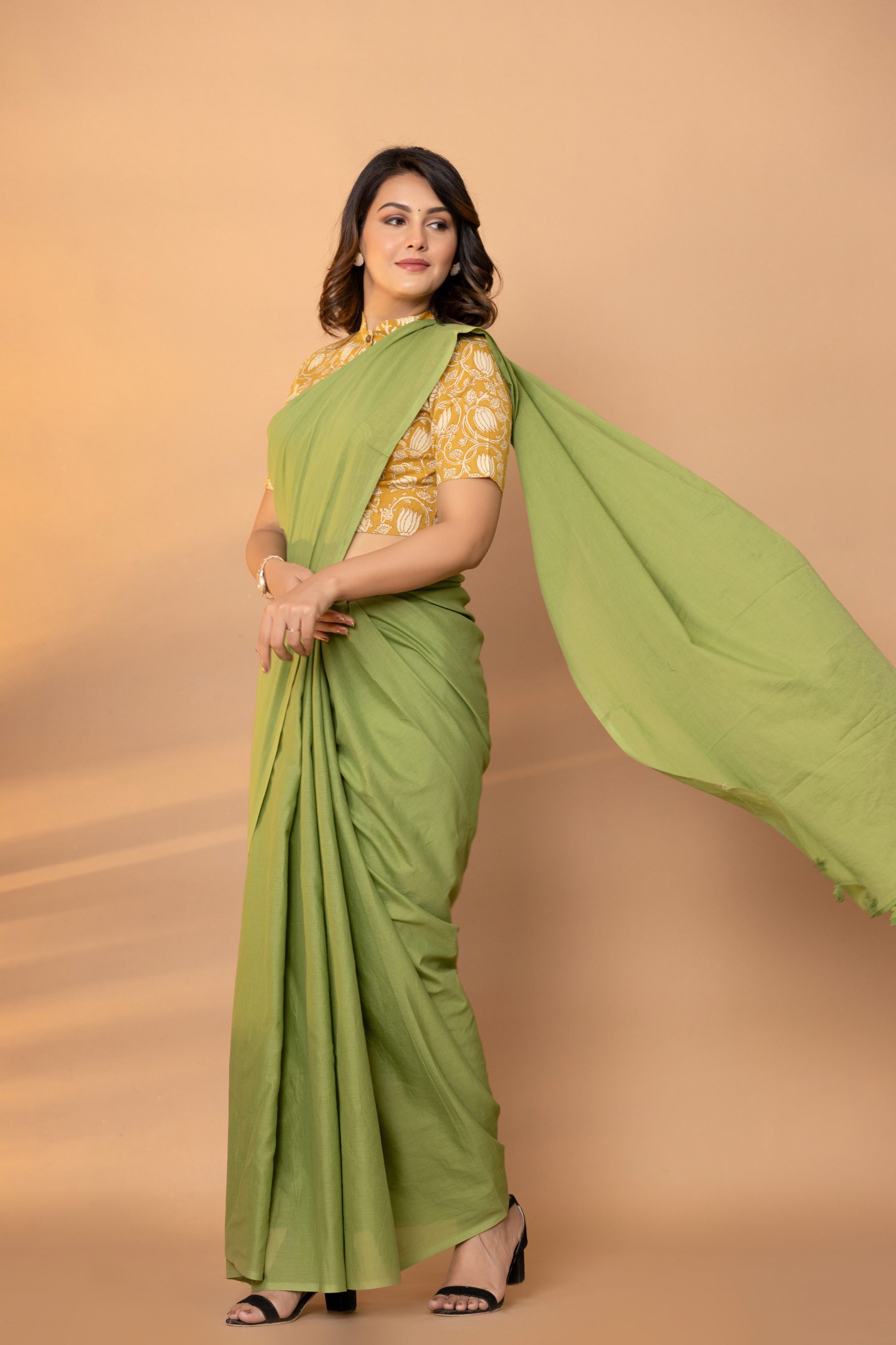 Avocado Green Plain Dyed Mul Mul Cotton Saree with Tassels (without Blouse)