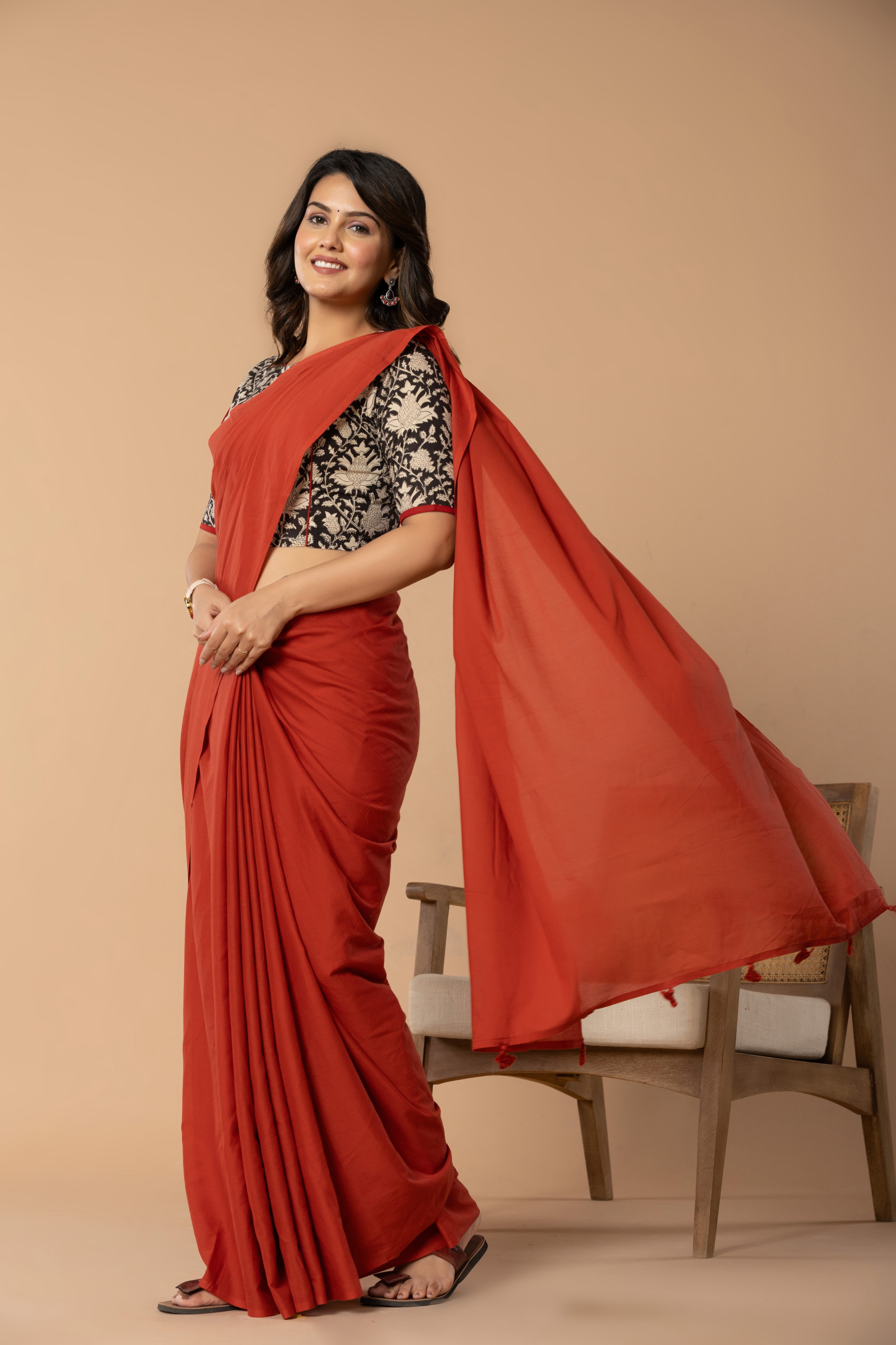 Brick Red Plain Dyed Mul Mul Cotton Saree with Tassels (without Blouse)