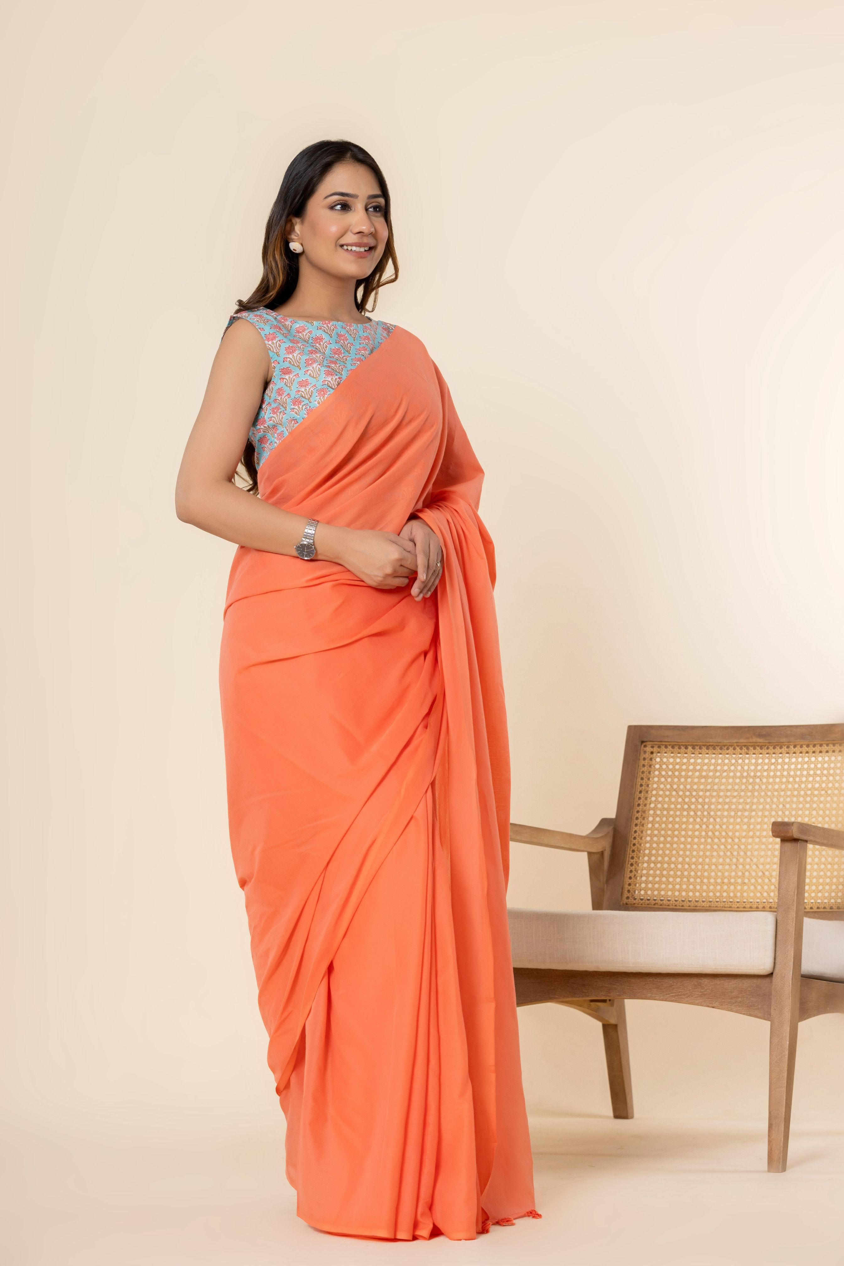 Coral Peach Plain Dyed Mul Mul Cotton Saree with Tassels (without Blouse)
