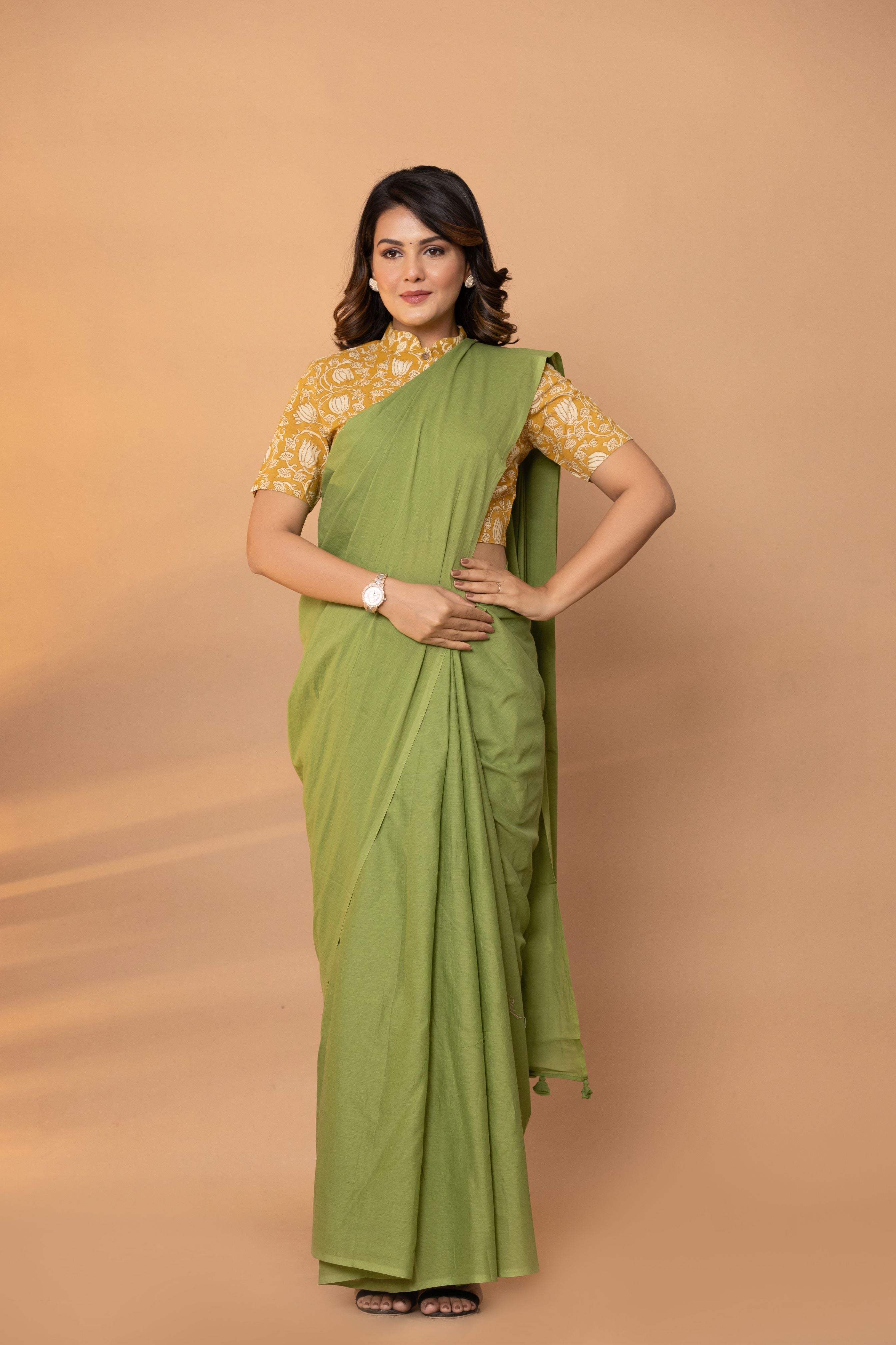 Avocado Green Plain Dyed Mul Mul Cotton Saree with Tassels (without Blouse)