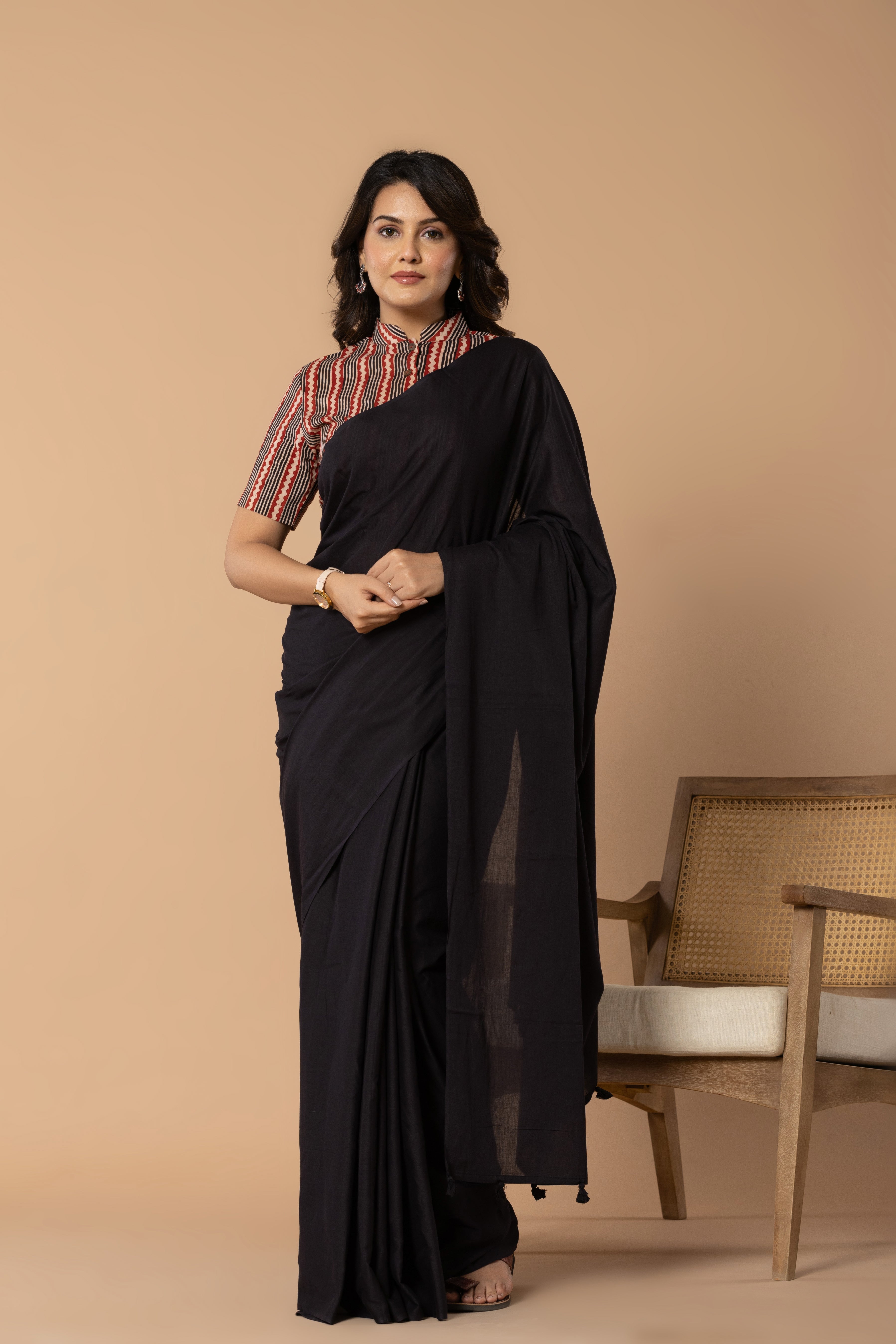 Black Plain Dyed Mul Mul Cotton Saree with Tassels (without Blouse)