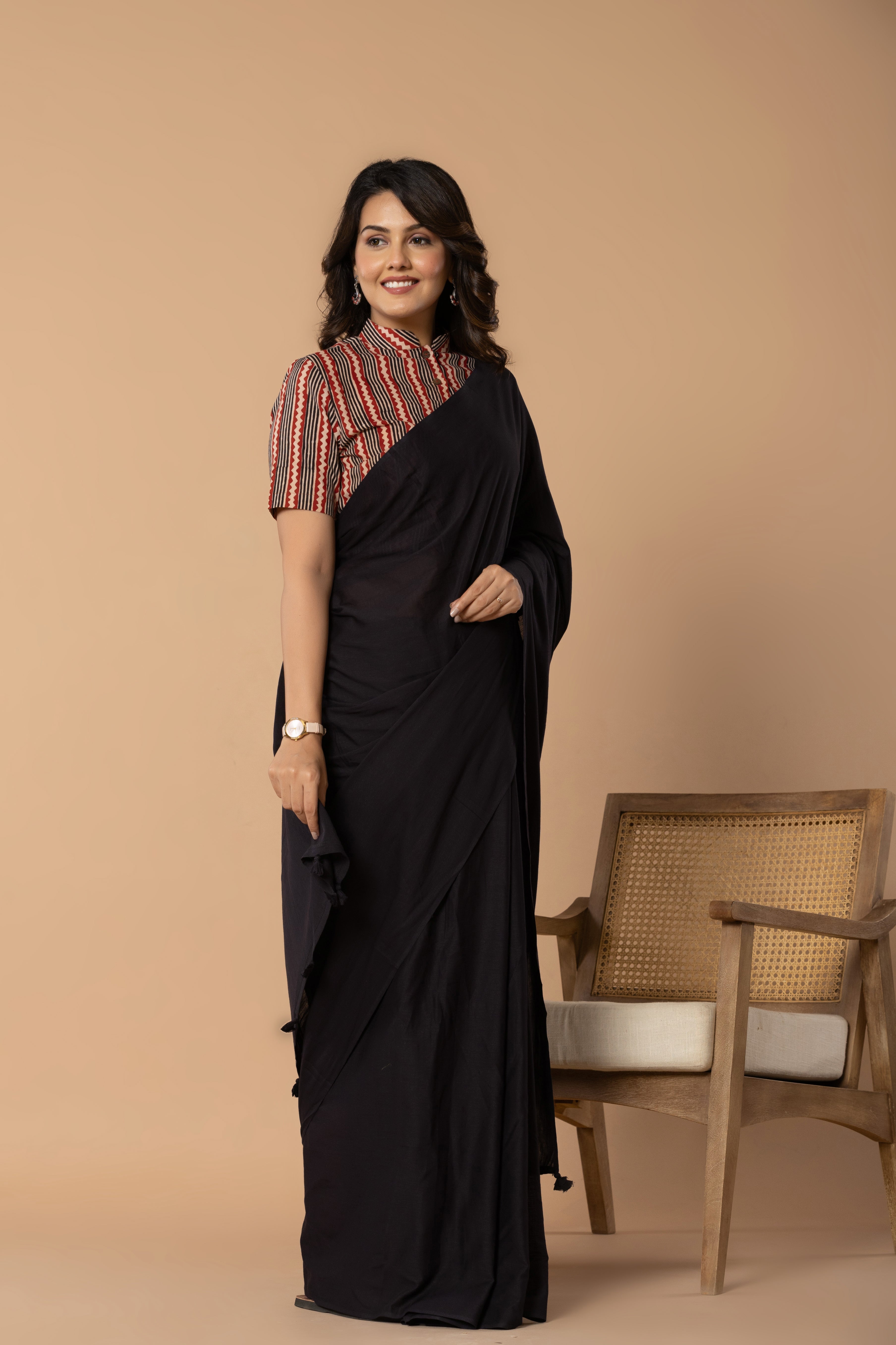 Black Plain Dyed Mul Mul Cotton Saree with Tassels (without Blouse)