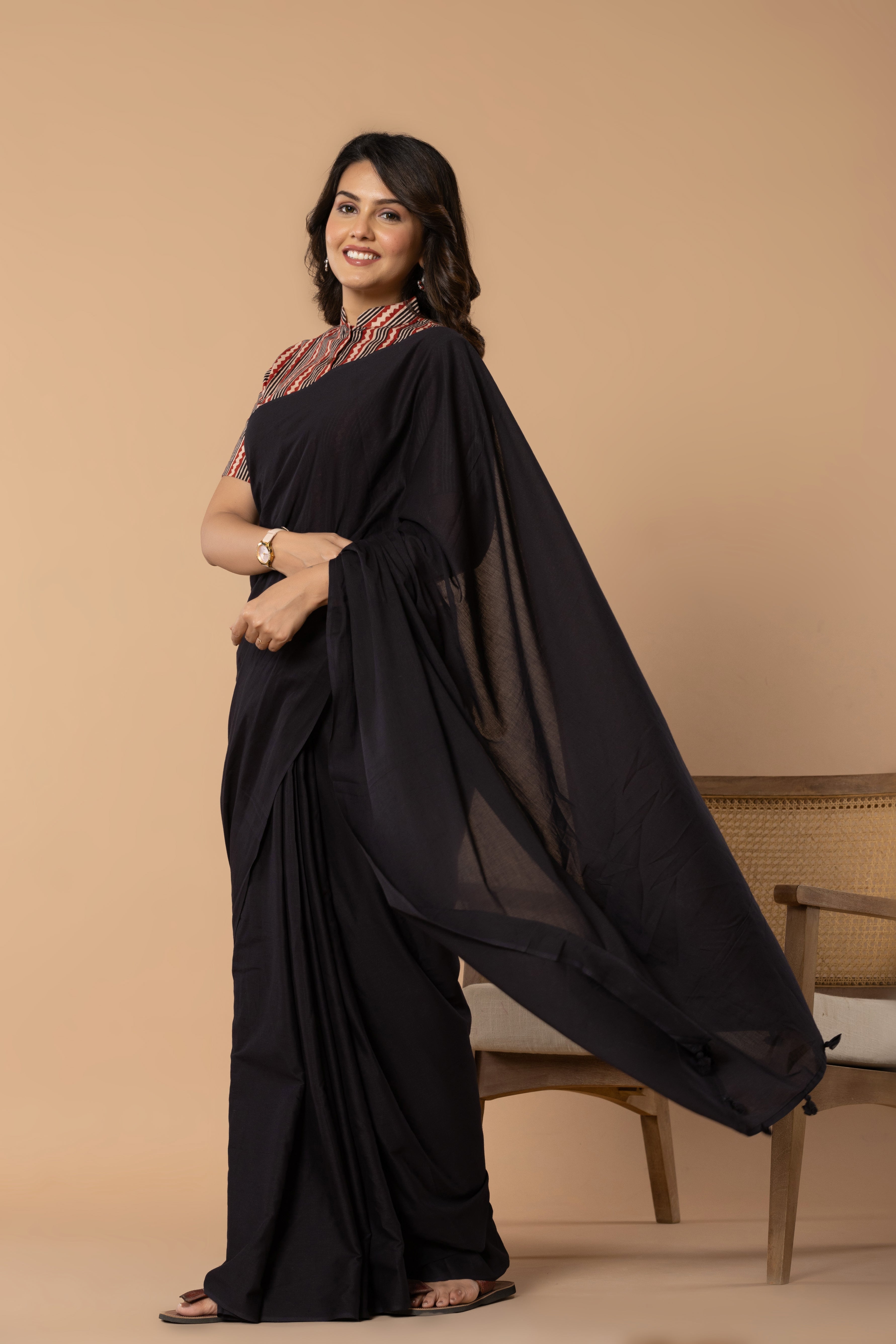 Black Plain Dyed Mul Mul Cotton Saree with Tassels (without Blouse)