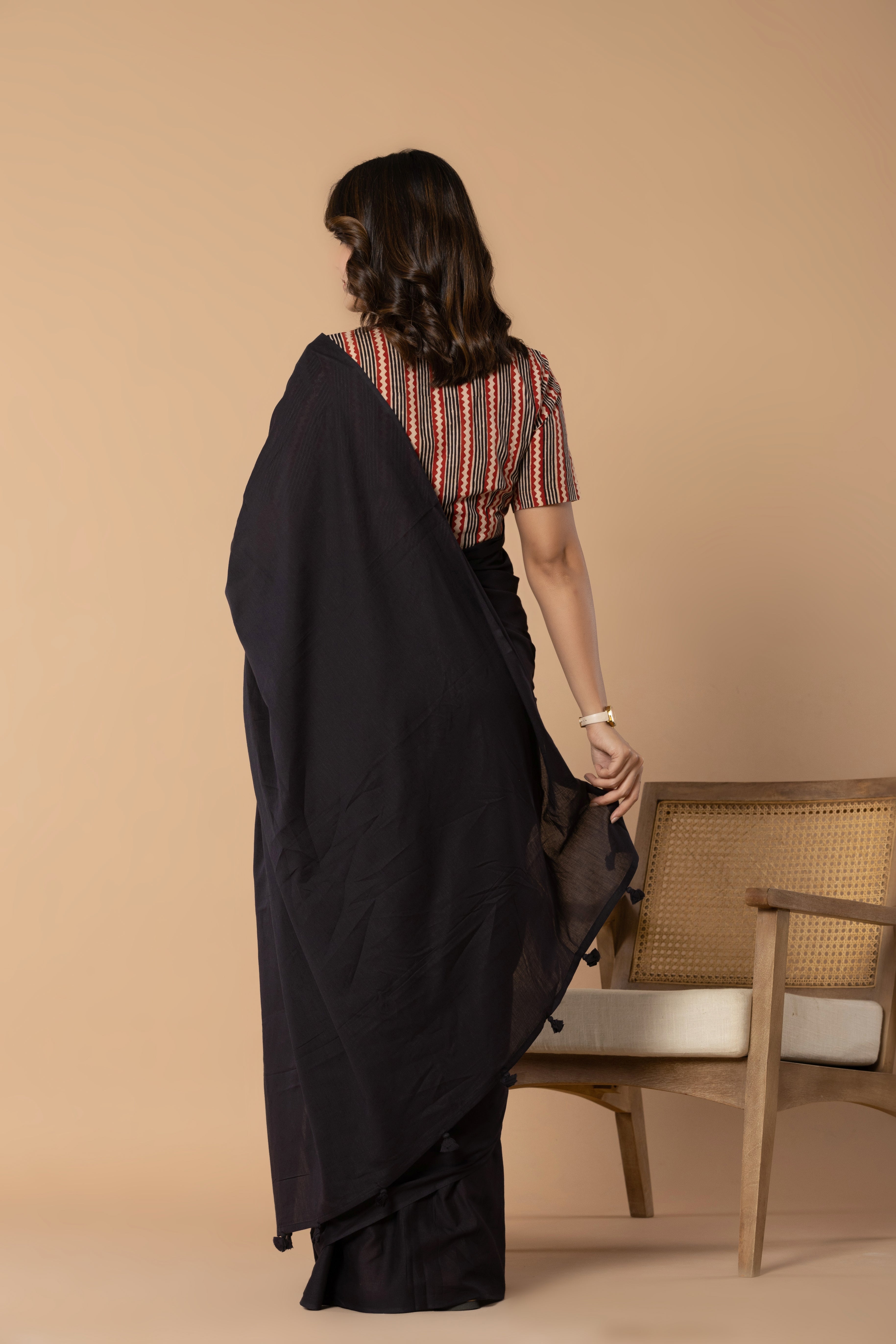 Black Plain Dyed Mul Mul Cotton Saree with Tassels (without Blouse)