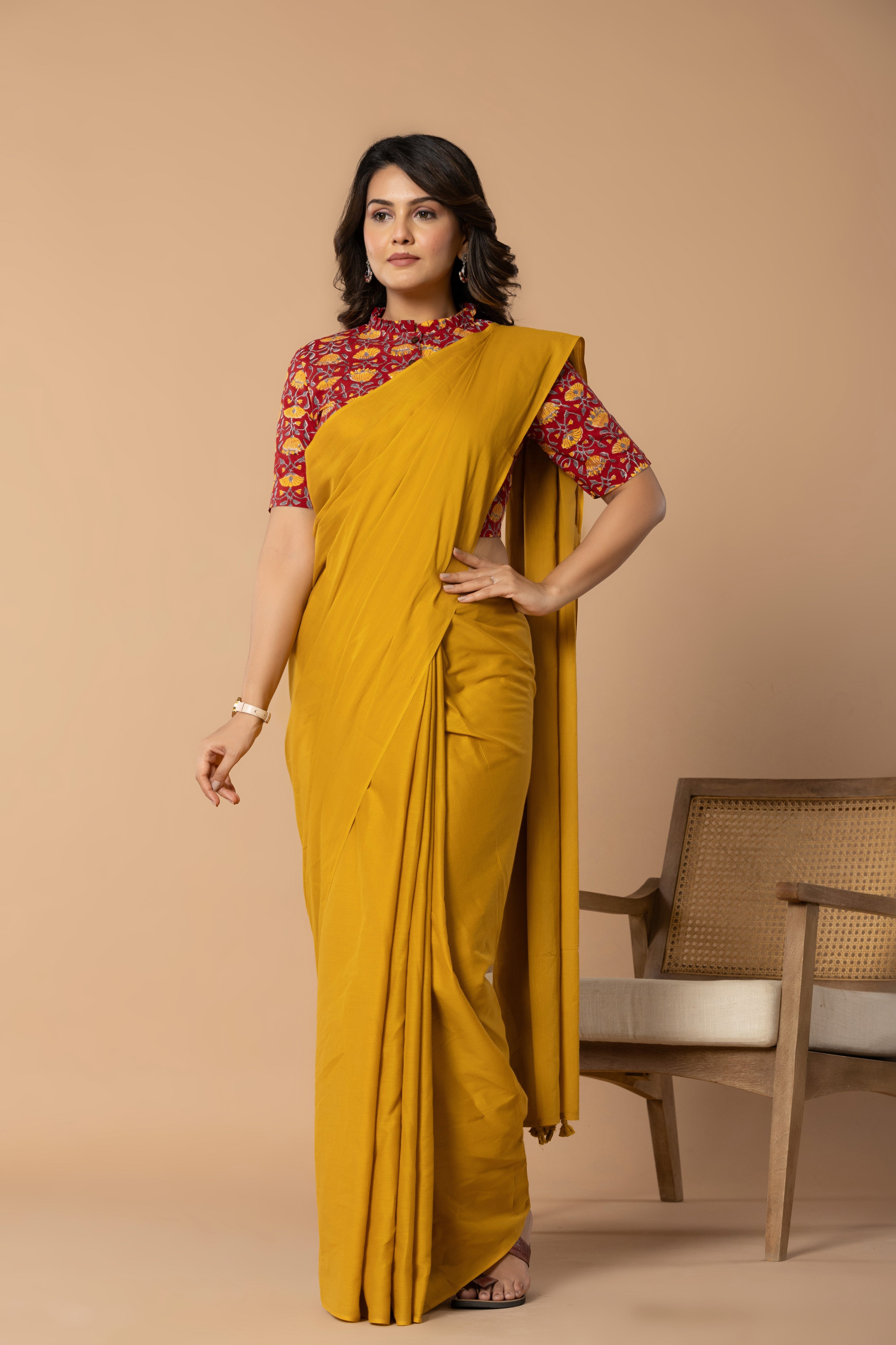 Earthy Yellow Plain Dyed Mul Mul Cotton Saree with Tassels (without Blouse)