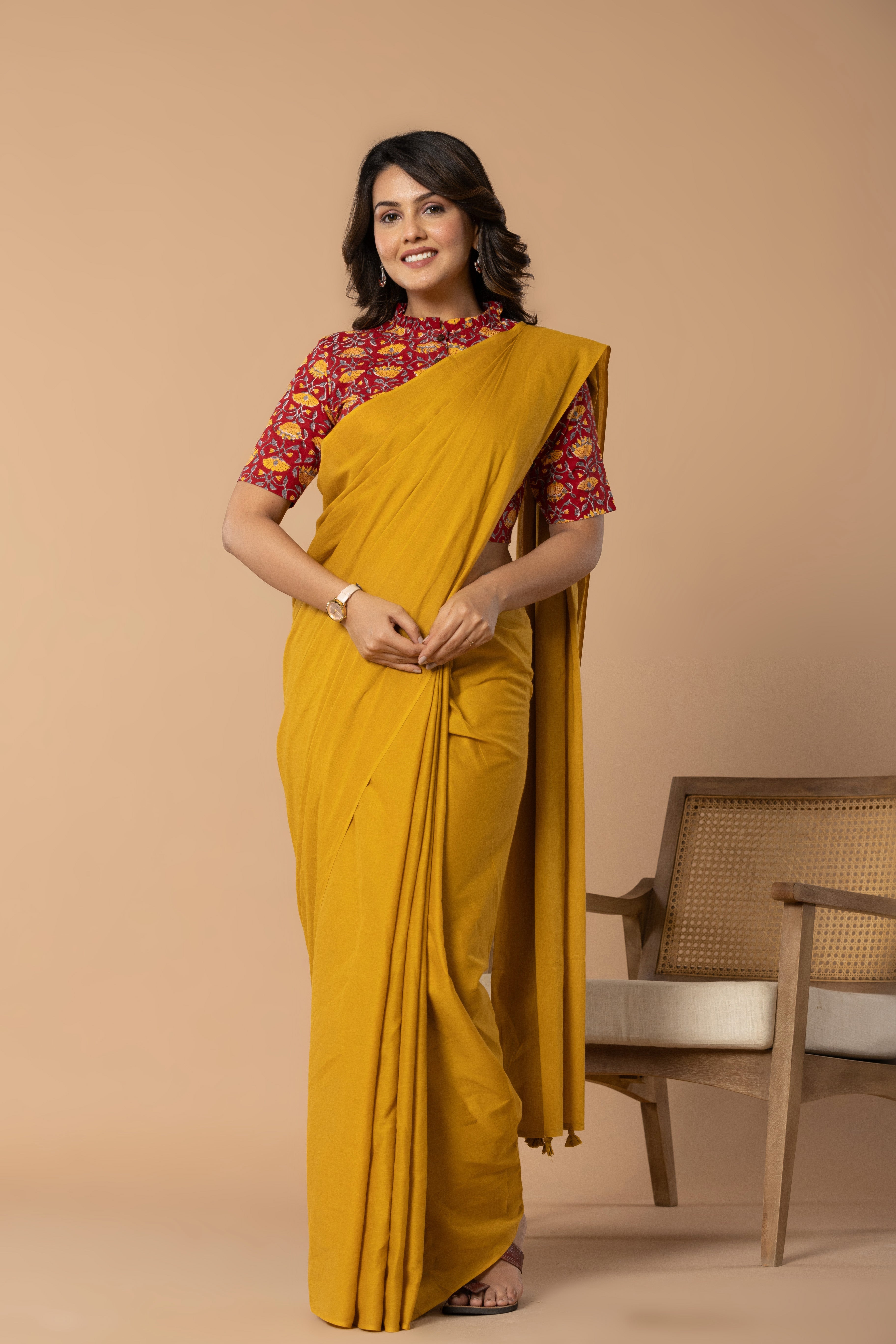 Earthy Yellow Plain Dyed Mul Mul Cotton Saree with Tassels (without Blouse)