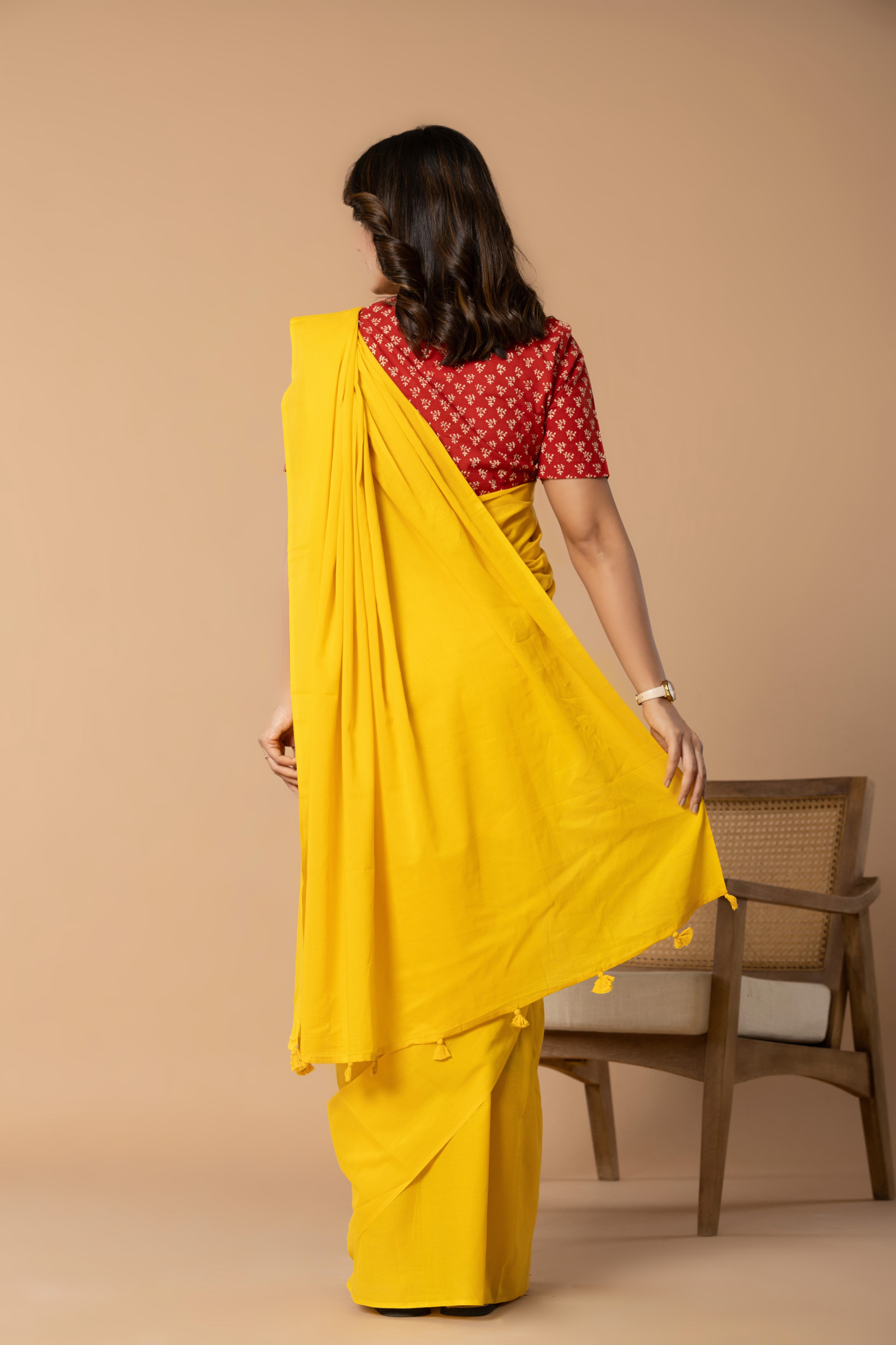 Sunshine Yellow Plain Dyed Mul Mul Cotton Saree with Tassels (without Blouse)