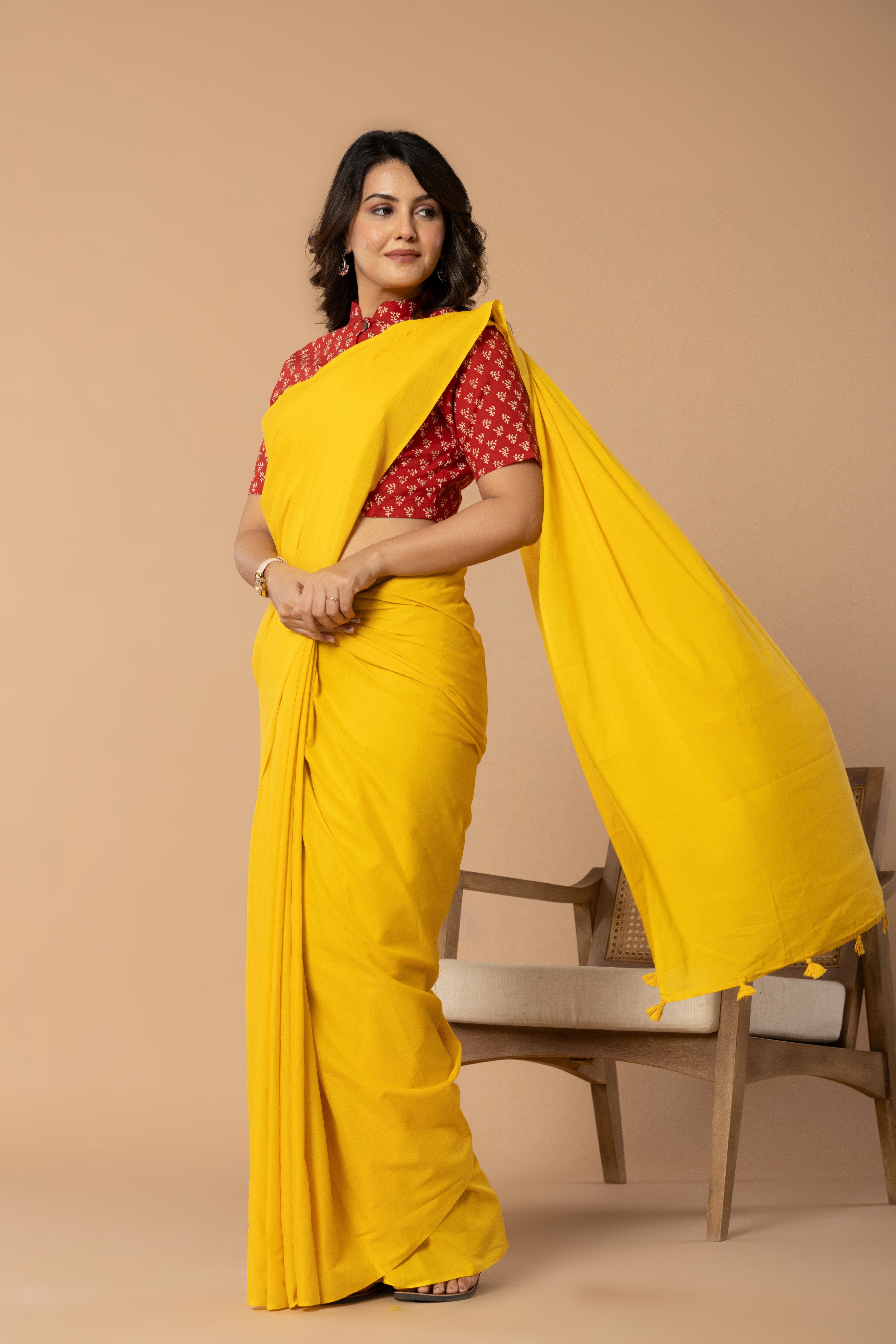 Sunshine Yellow Plain Dyed Mul Mul Cotton Saree with Tassels (without Blouse)