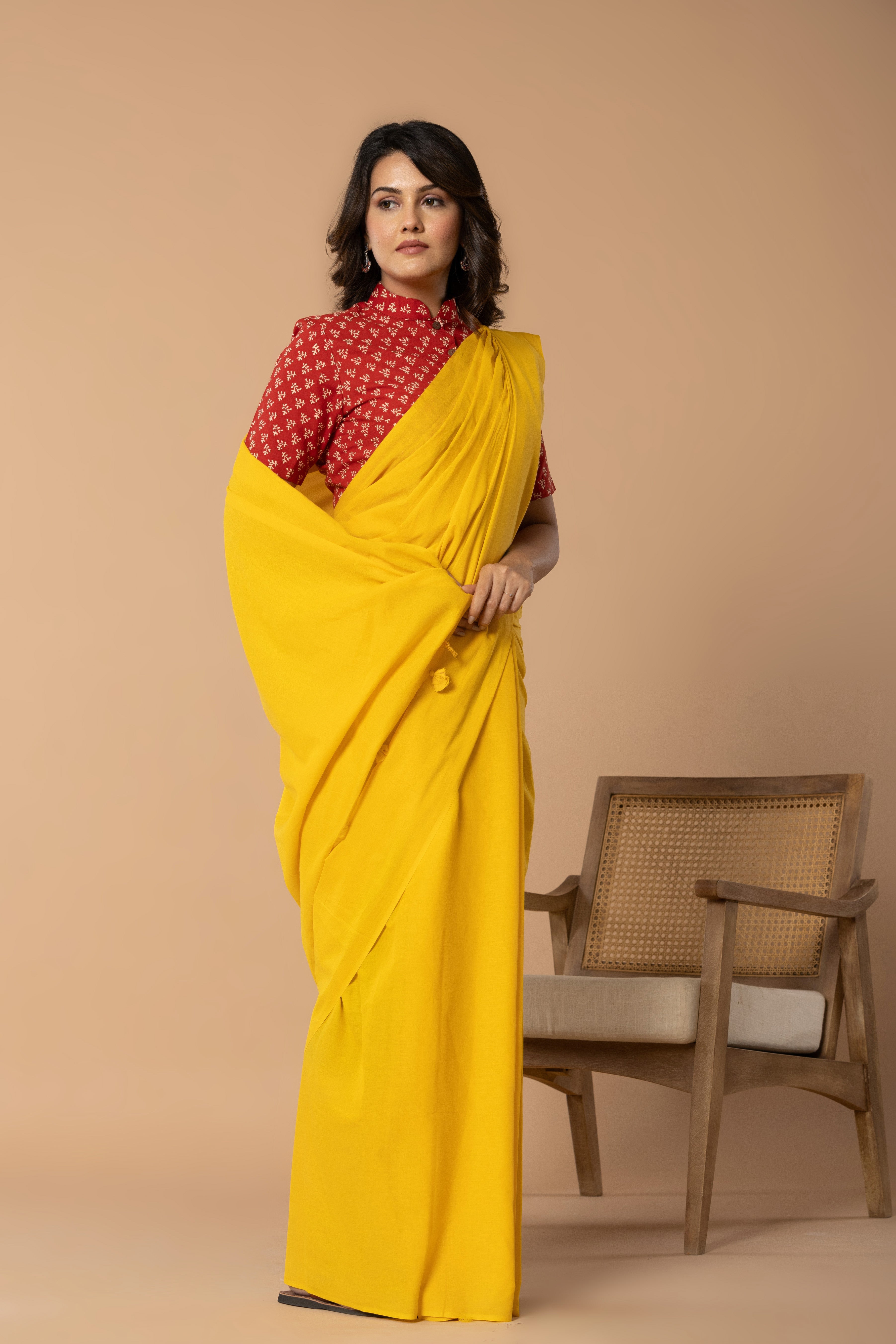 Sunshine Yellow Plain Dyed Mul Mul Cotton Saree with Tassels (without Blouse)