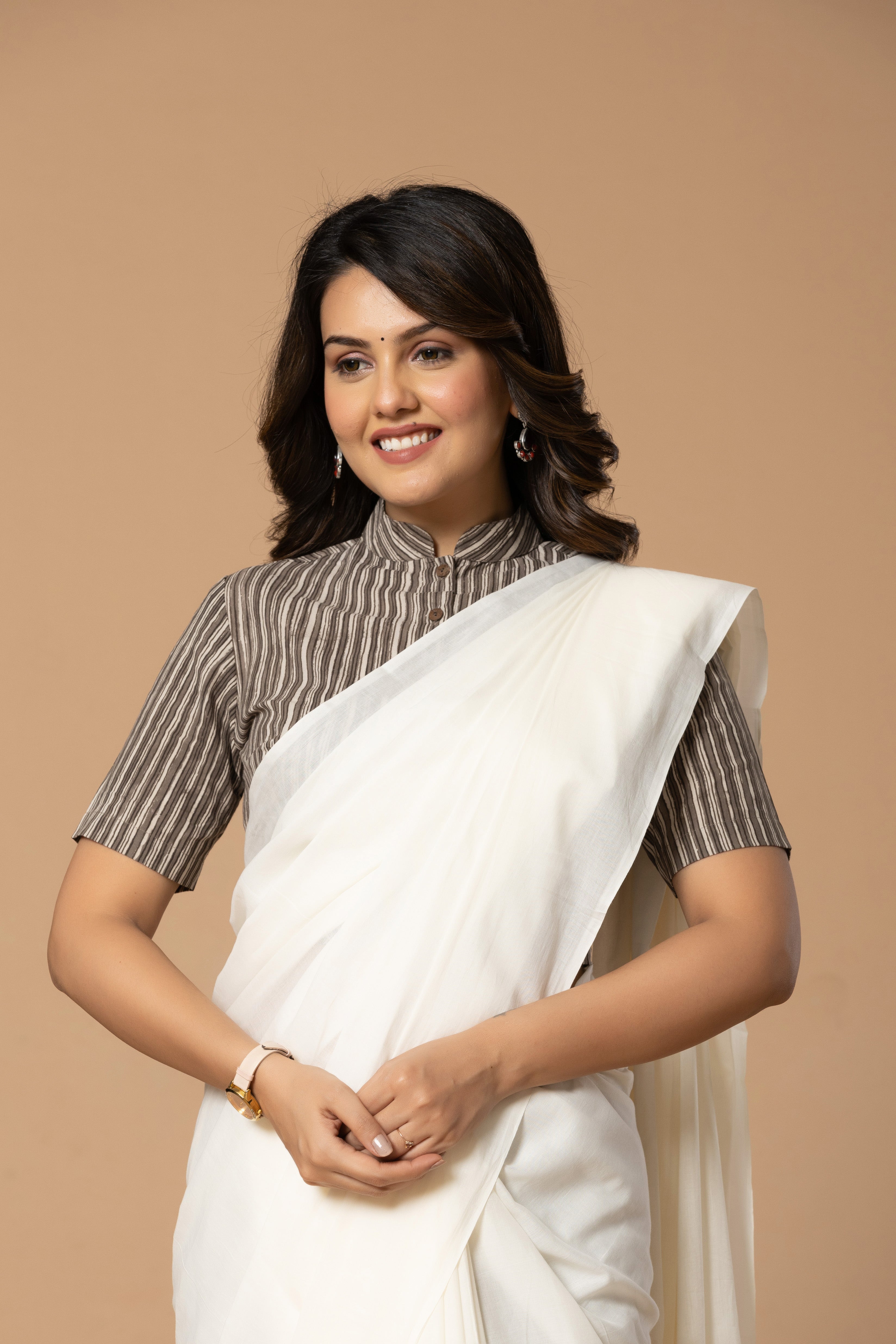 Natural White Plain Dyed Mul Mul Cotton Saree with Tassels (without Blouse)