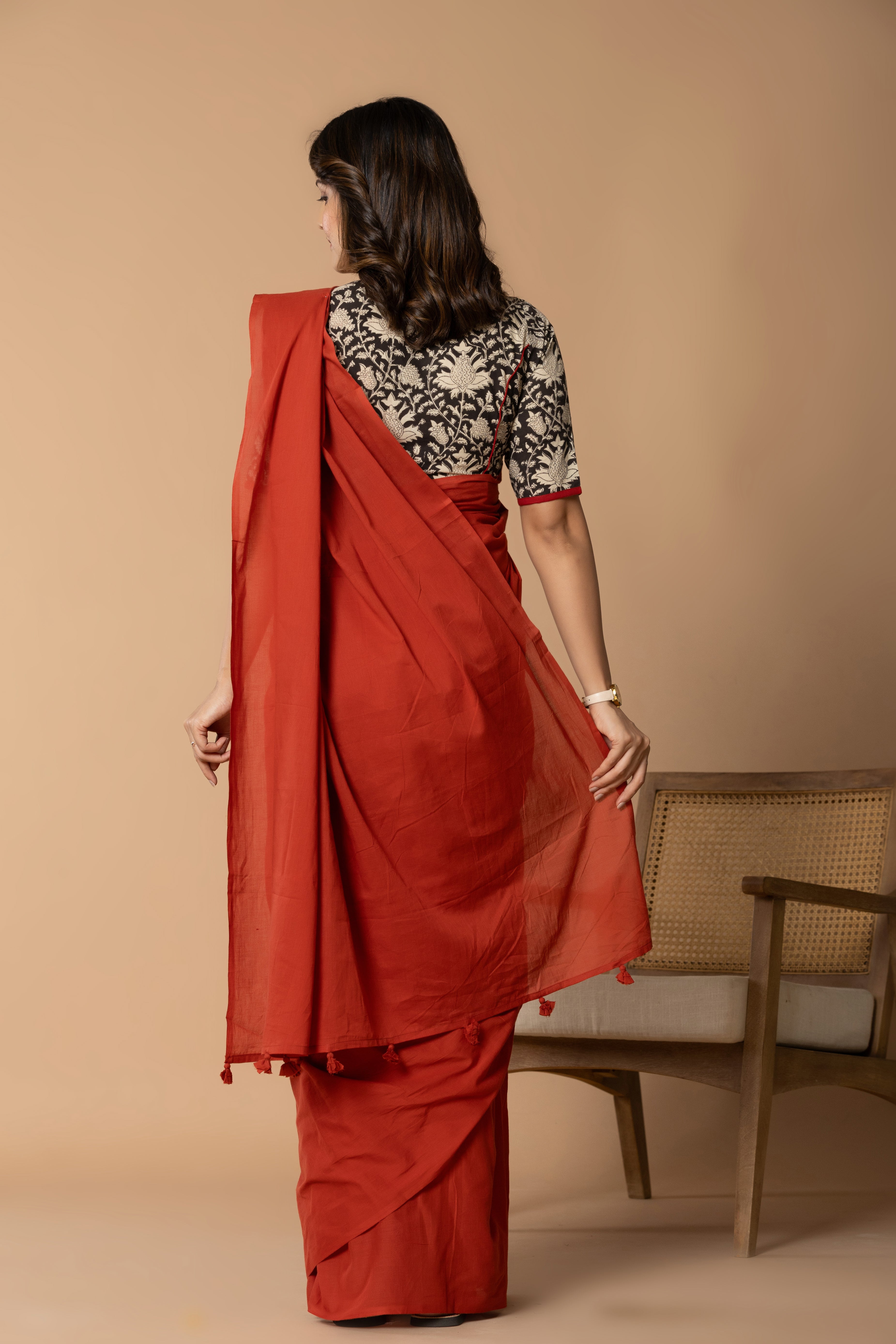 Brick Red Plain Dyed Mul Mul Cotton Saree with Tassels (without Blouse)