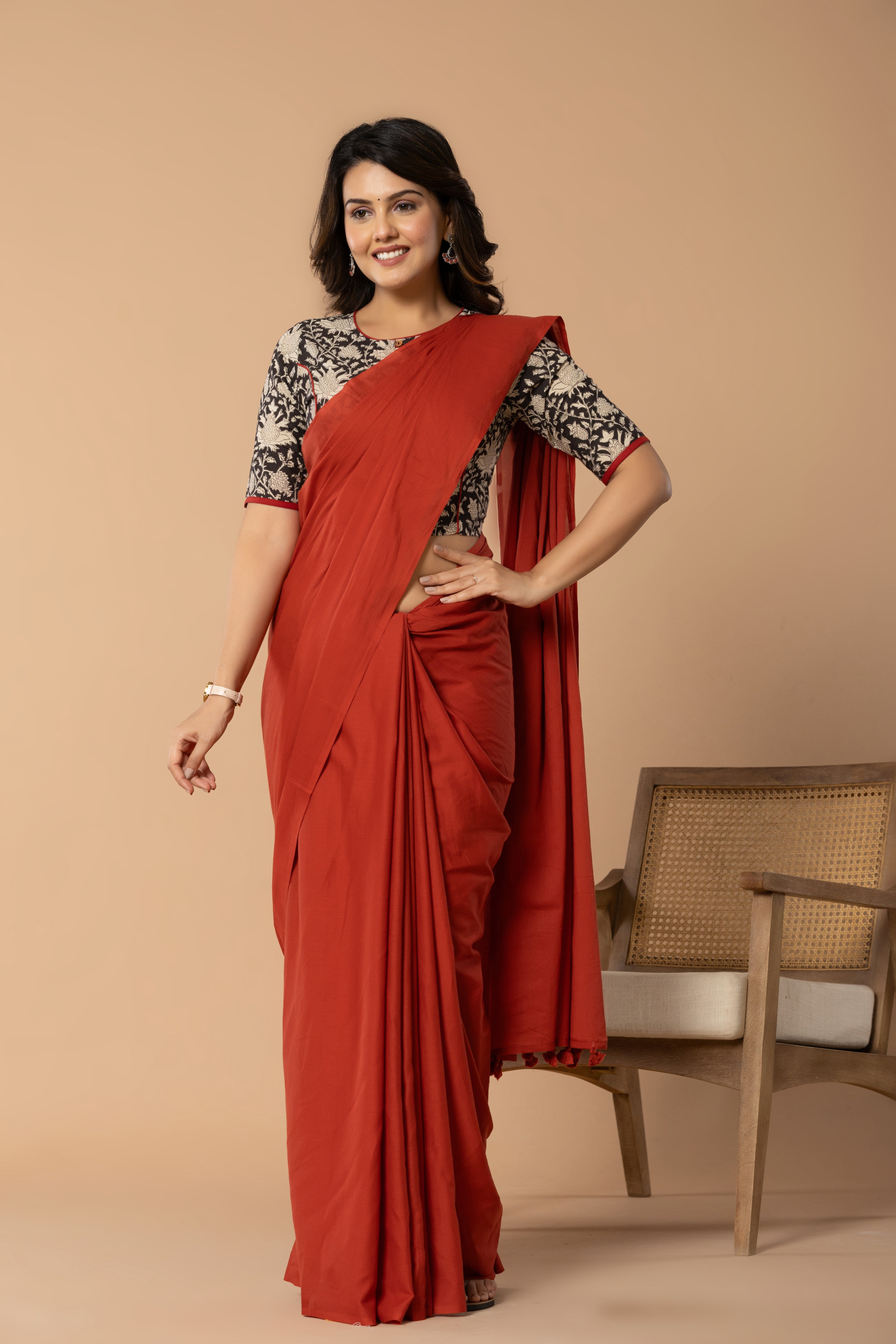 Brick Red Plain Dyed Mul Mul Cotton Saree with Tassels (without Blouse)