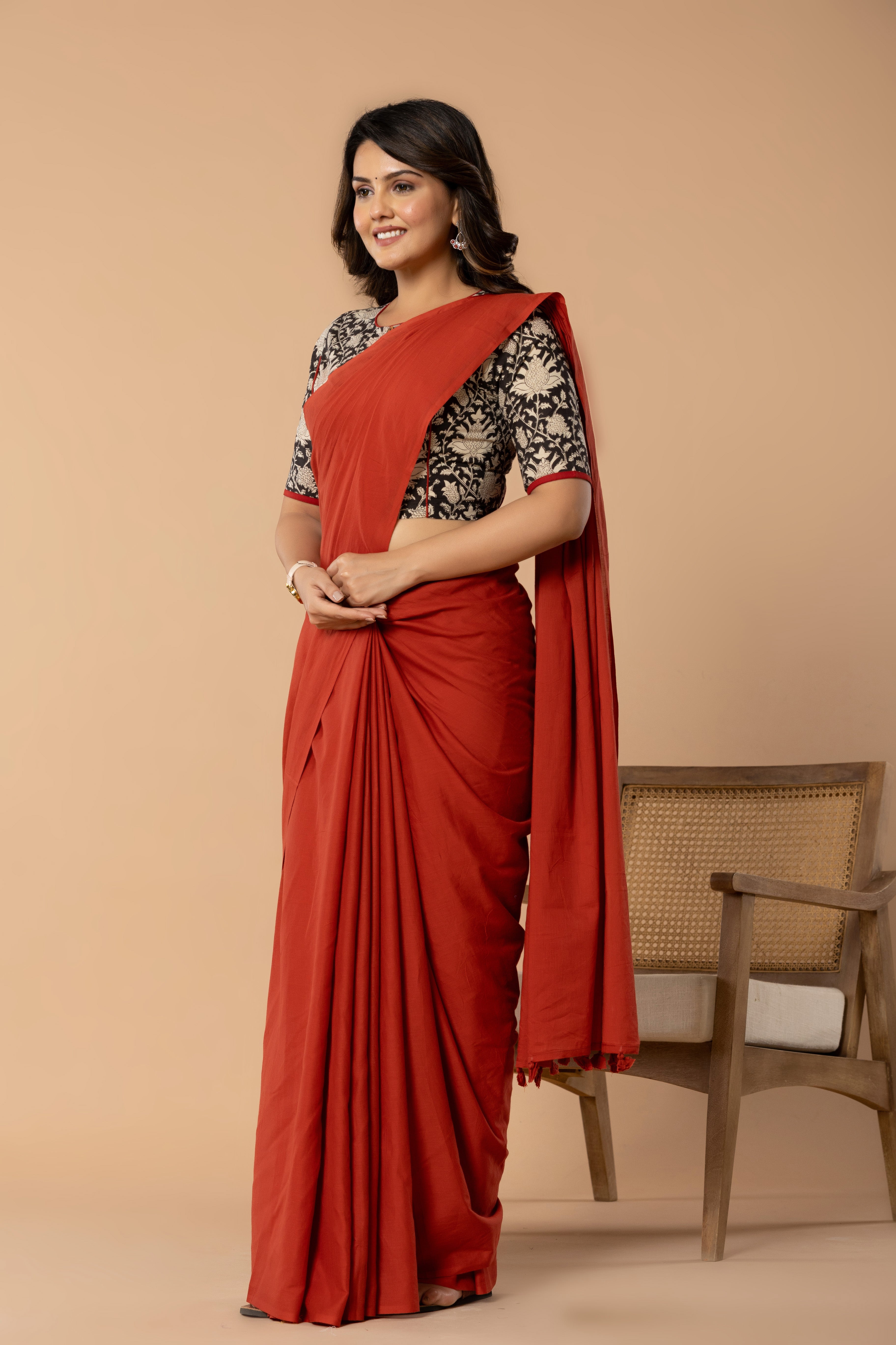 Brick Red Plain Dyed Mul Mul Cotton Saree with Tassels (without Blouse)