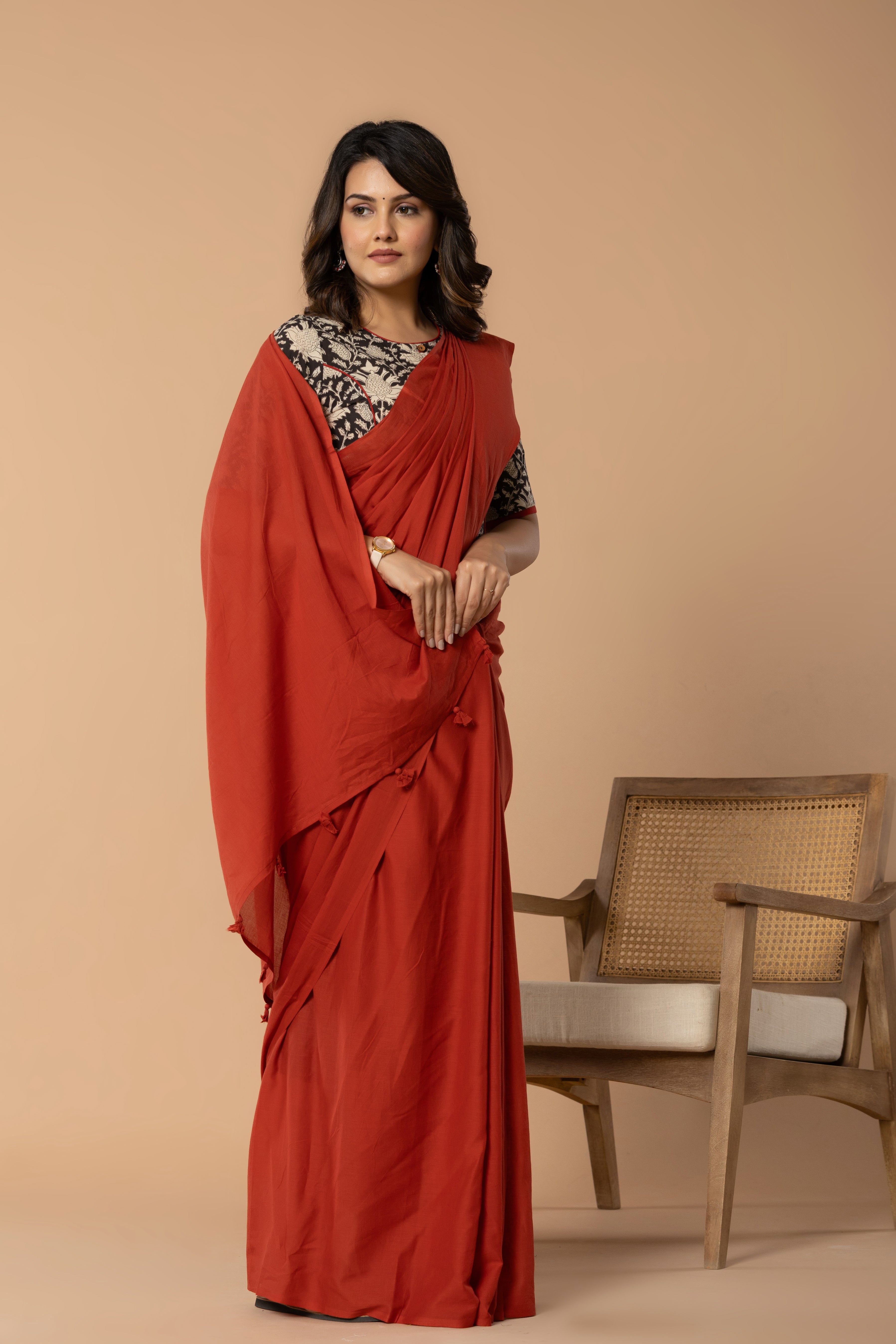 Brick Red Plain Dyed Mul Mul Cotton Saree with Tassels (without Blouse)