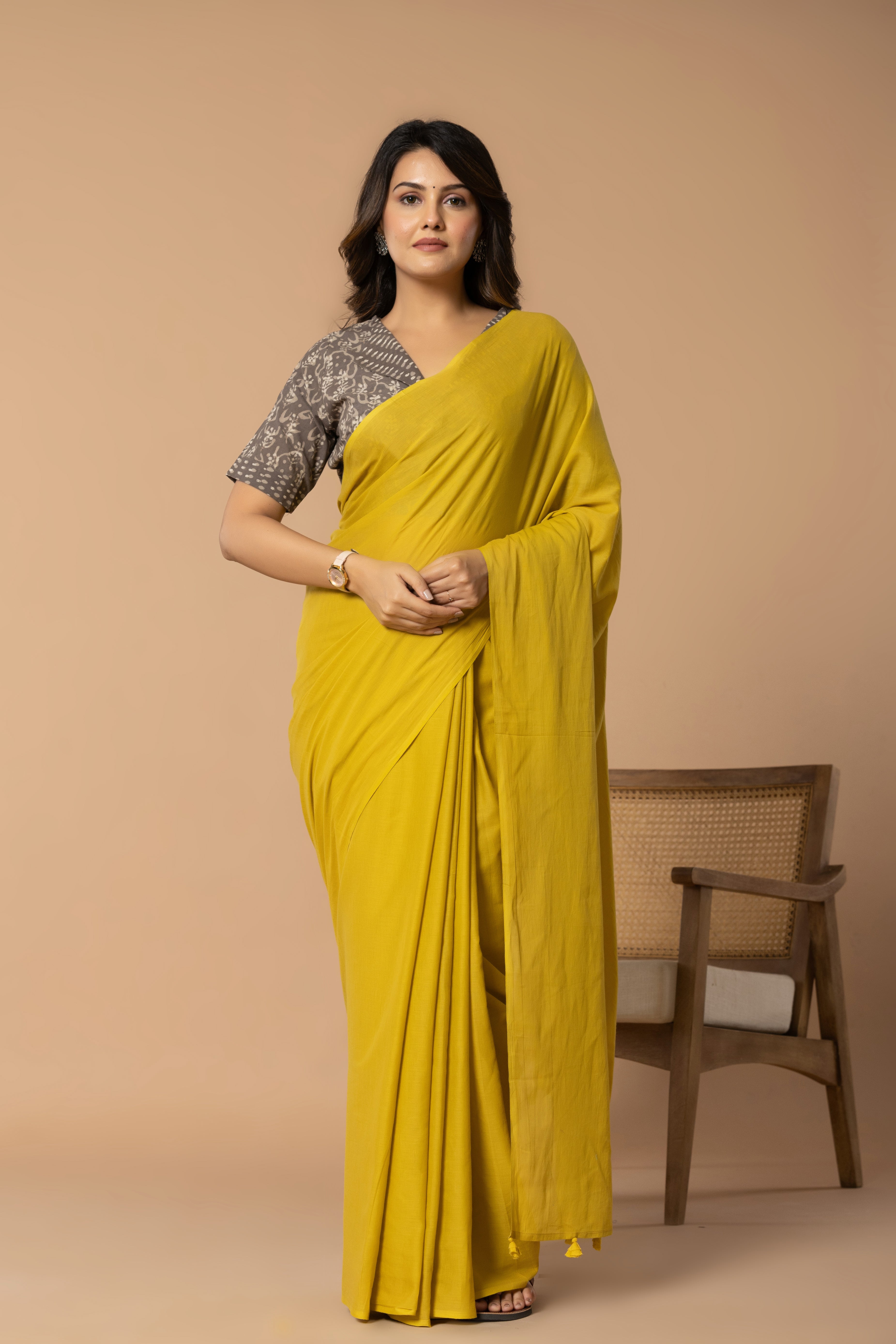 Rustic Yellow Plain Dyed Mul Mul Cotton Saree with Tassels (without Blouse)