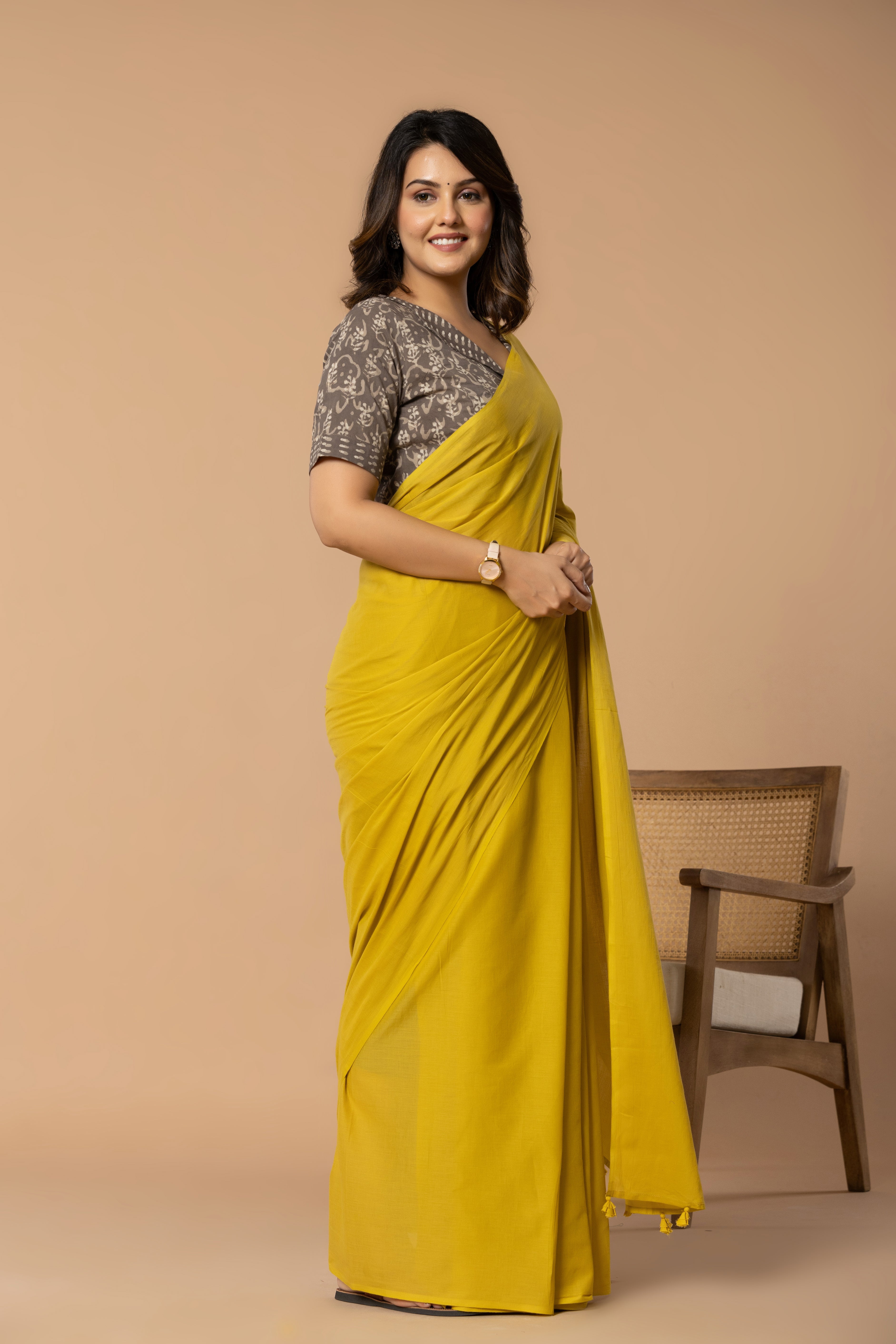 Rustic Yellow Plain Dyed Mul Mul Cotton Saree with Tassels (without Blouse)