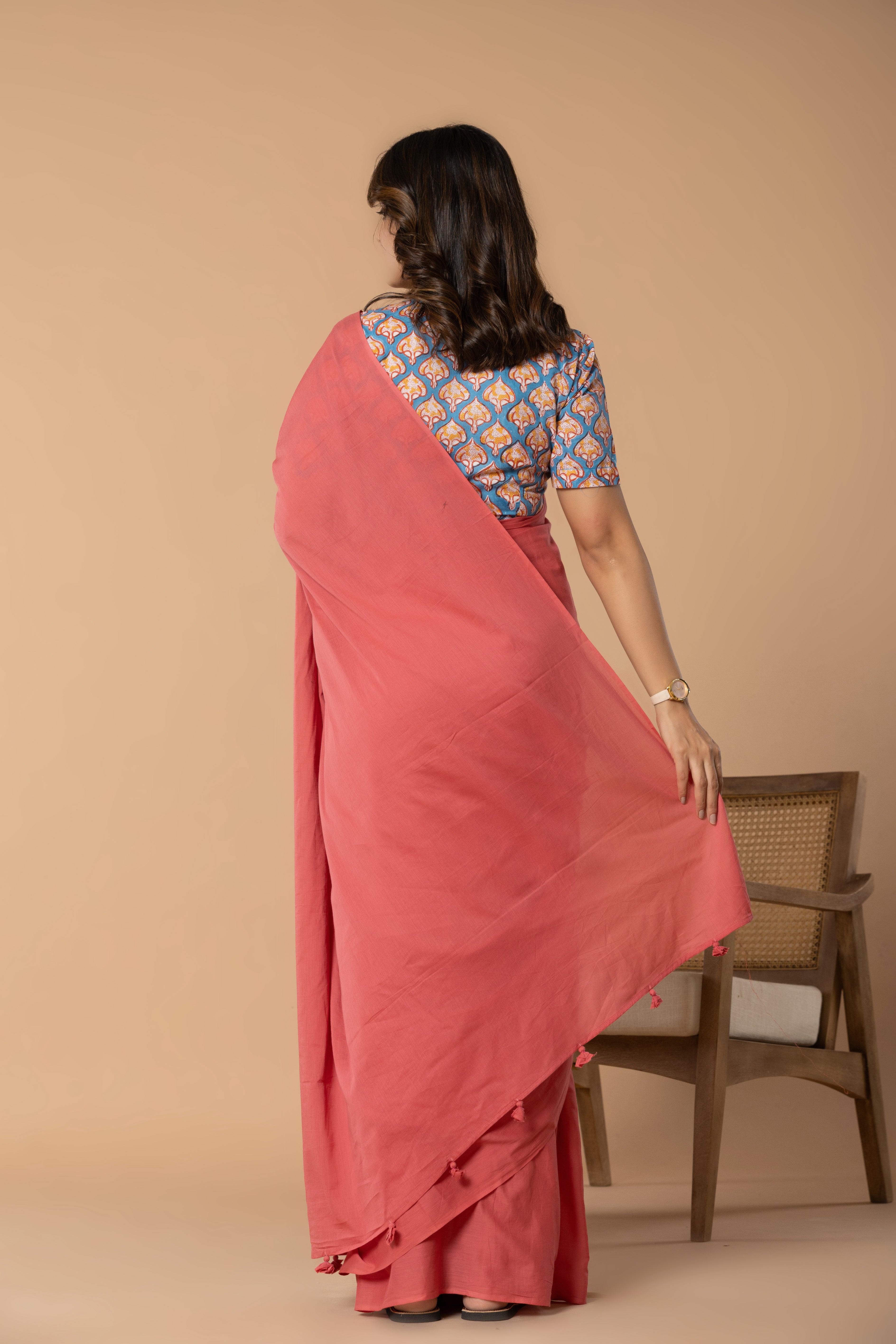 Coral Plain Dyed Mul Mul Cotton Saree with Tassels (without Blouse)