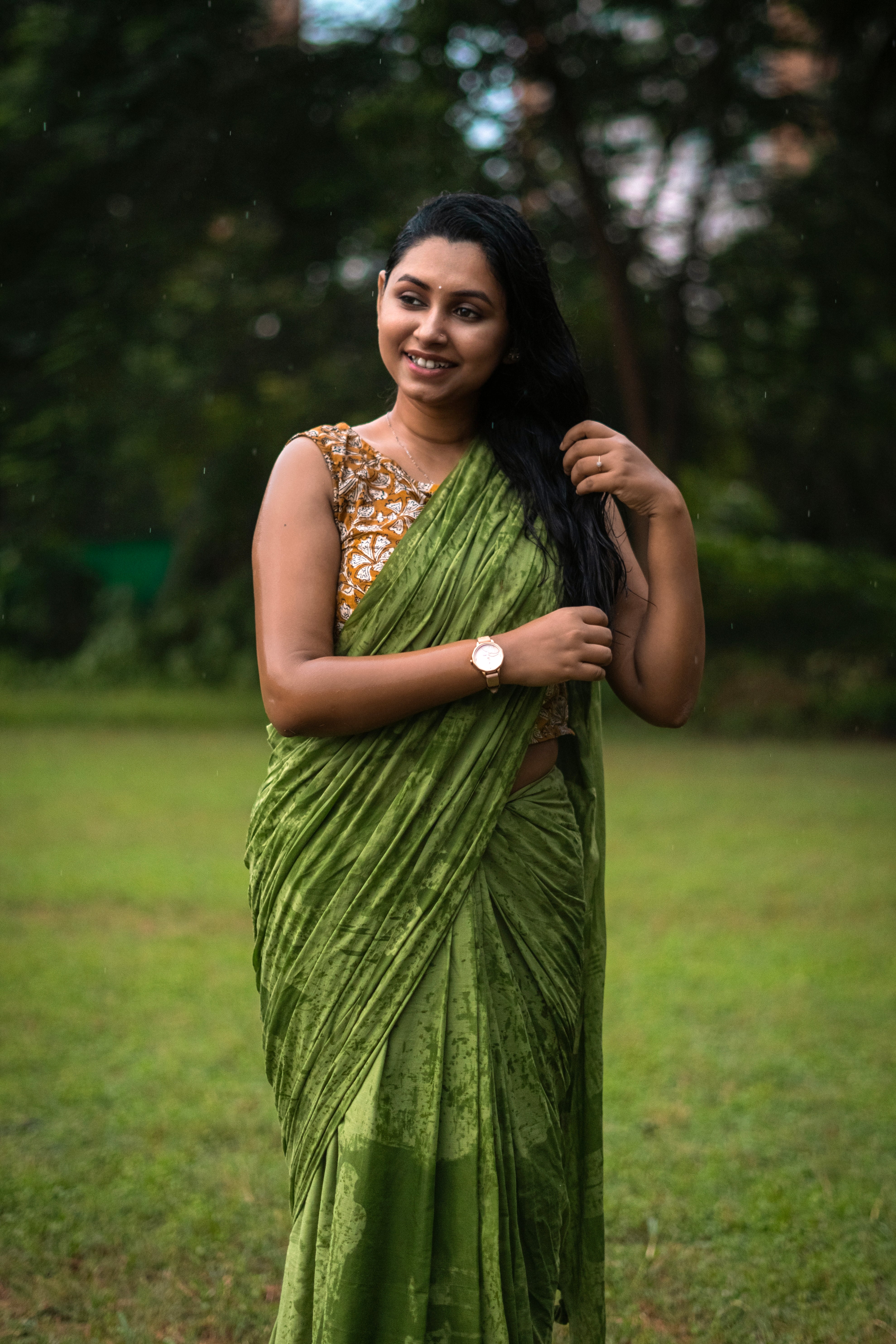 Avocado Green Plain Dyed Mul Mul Cotton Saree with Tassels (without Blouse)