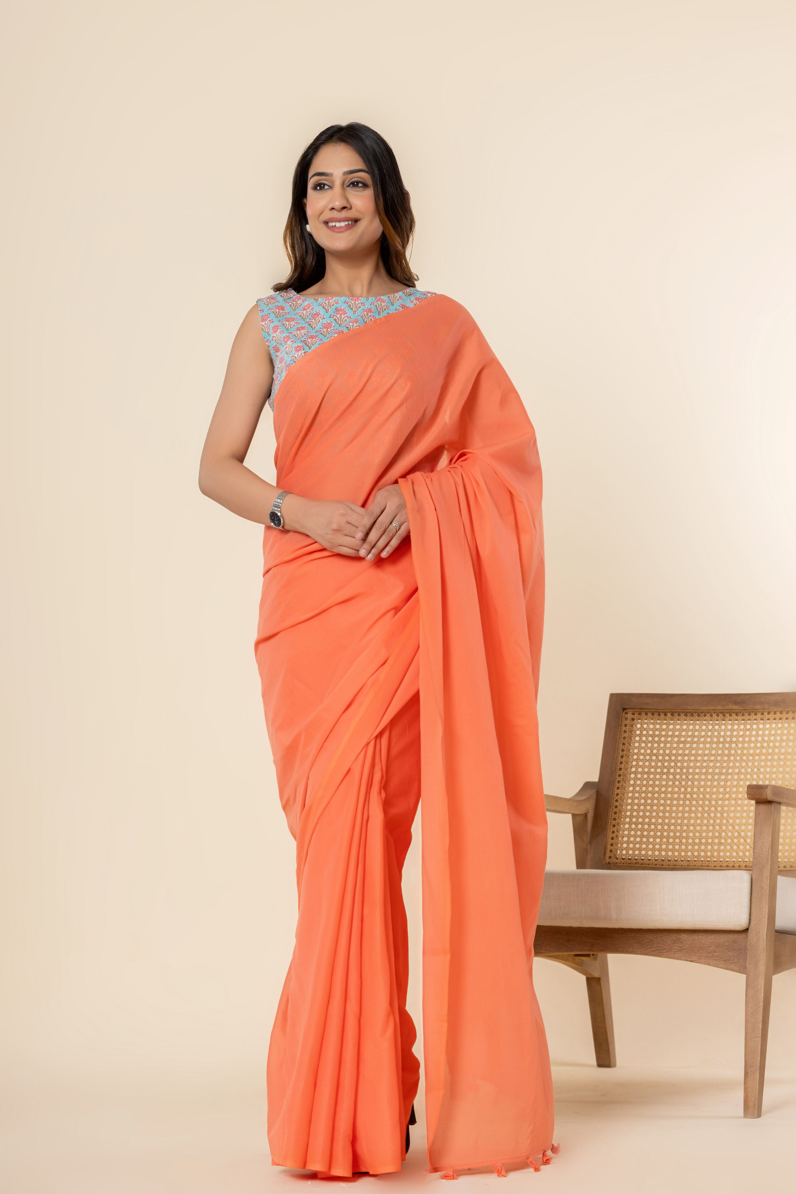 Coral Peach Plain Dyed Mul Mul Cotton Saree with Tassels (without Blouse)